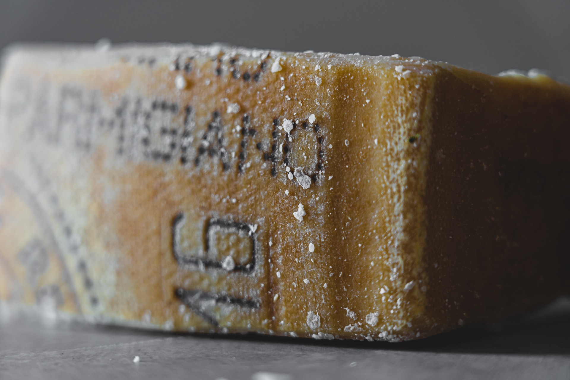 block-of-parmigiano-cheese-3693280 block-of-parmigiano-cheese-3693280
